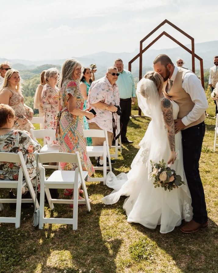 A first kiss at a Smoky Mountain mountaintop ceremony